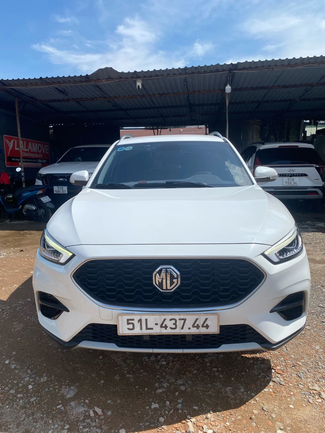 MG